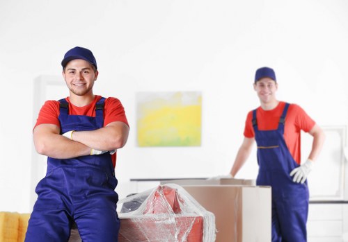 Moving team handling house removals in a London street