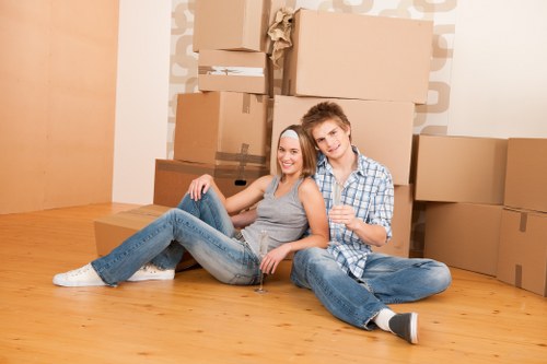 Movers handling IT equipment during a London business move