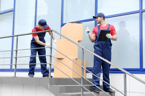 Removal team planning a move in a London street