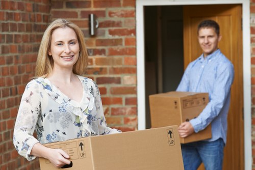 House movers loading furniture for a London home move