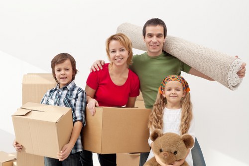 Packing boxes and household items for a London removals job