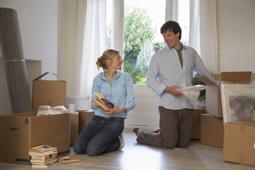 Movers handling access challenges in a London apartment building