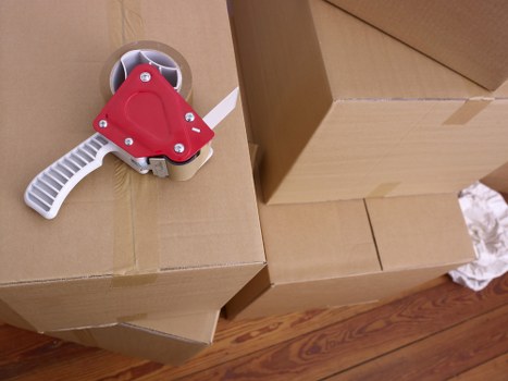Packed boxes and furniture prepared for removal truck hire in London